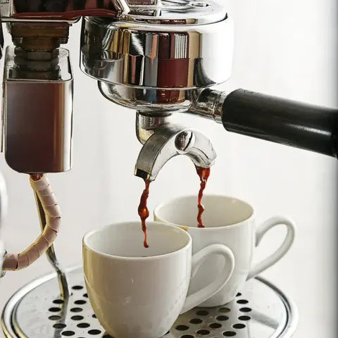 Two espresso shots pouring
